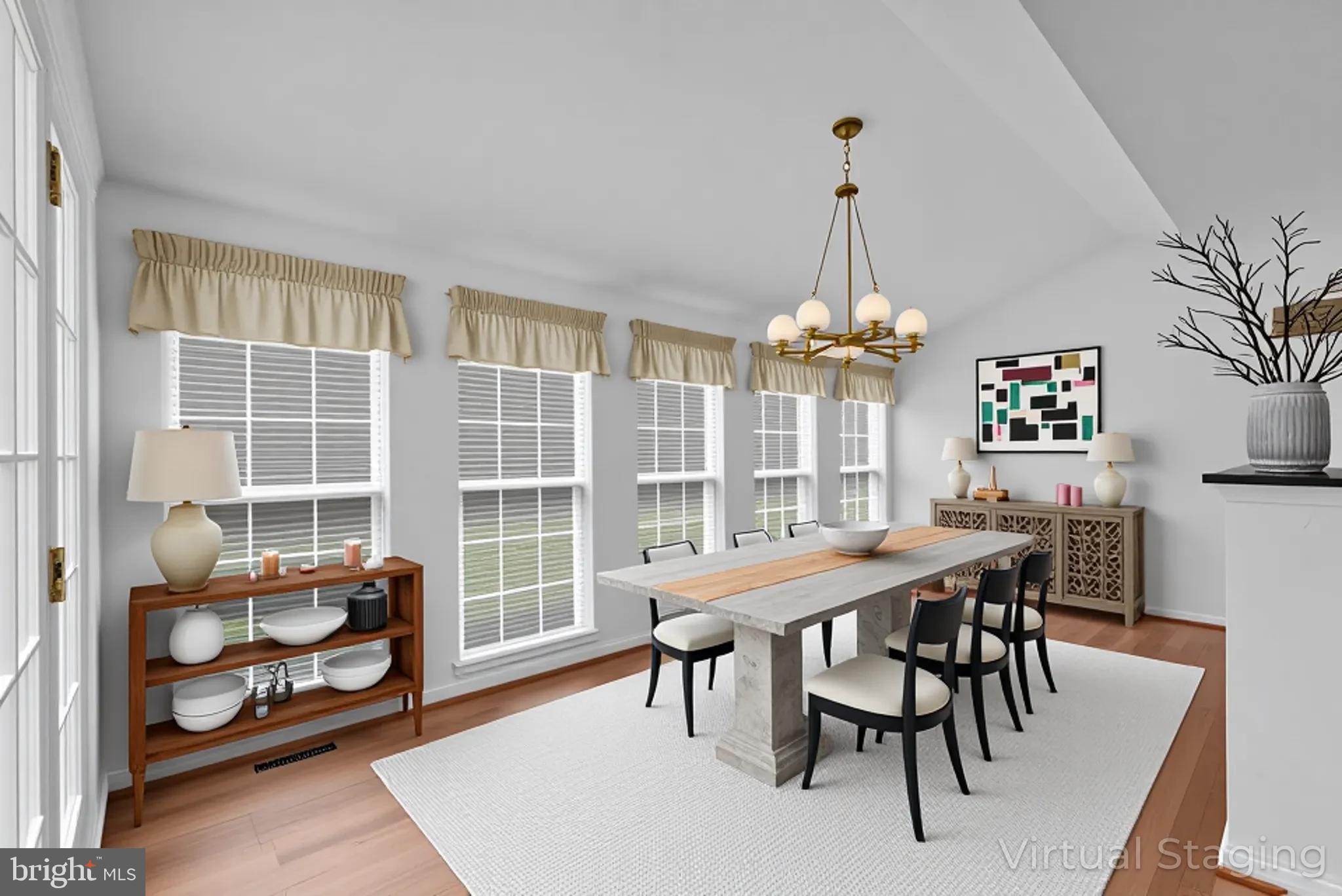 5184 Lovering Drive Doylestown, PA 18902 - Photo 14 of 51 a view of a dining room with furniture window and wooden floor