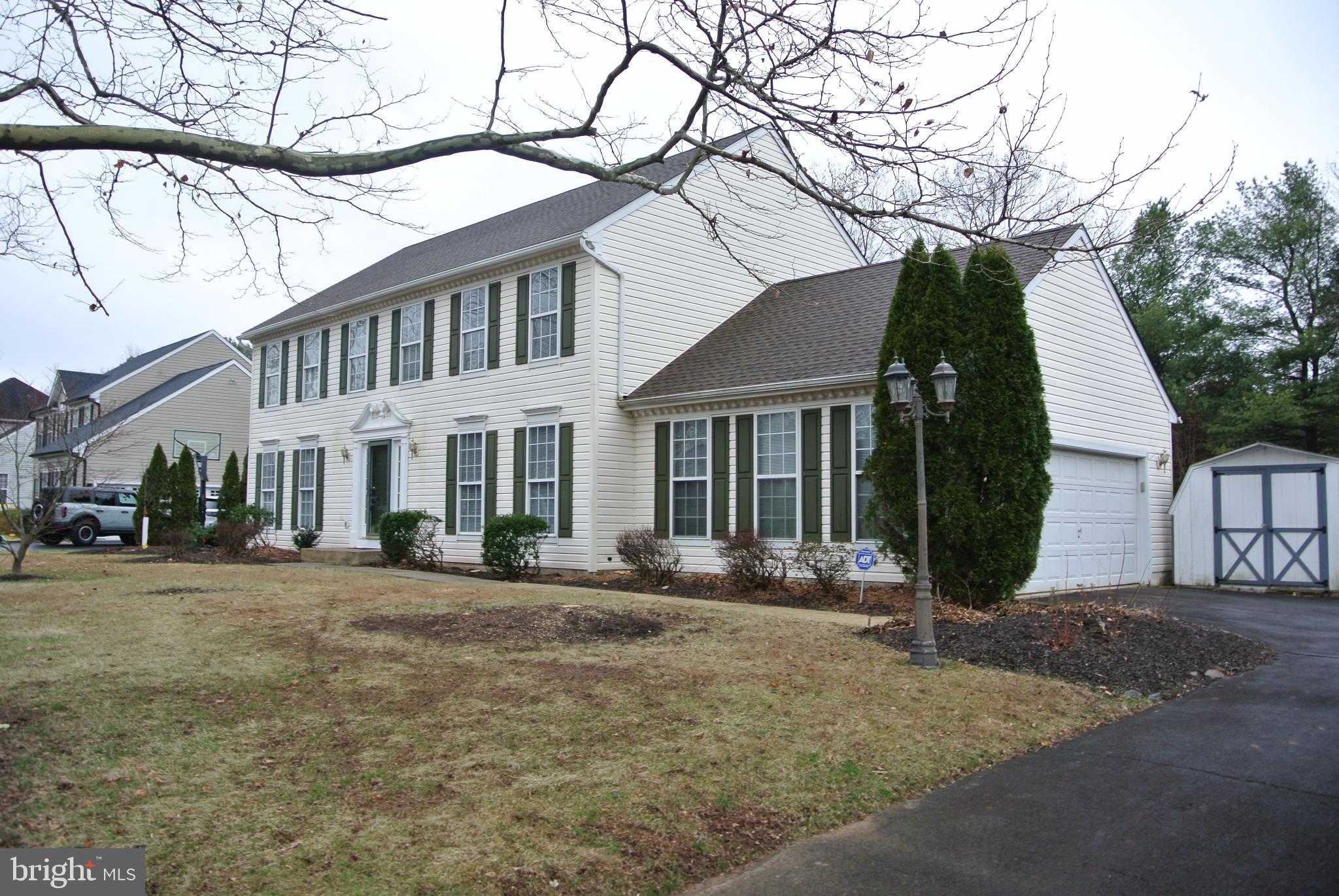 5184 Lovering Drive Doylestown, PA 18902 - Photo 2 of 51 a view of a house with a tree in front of it