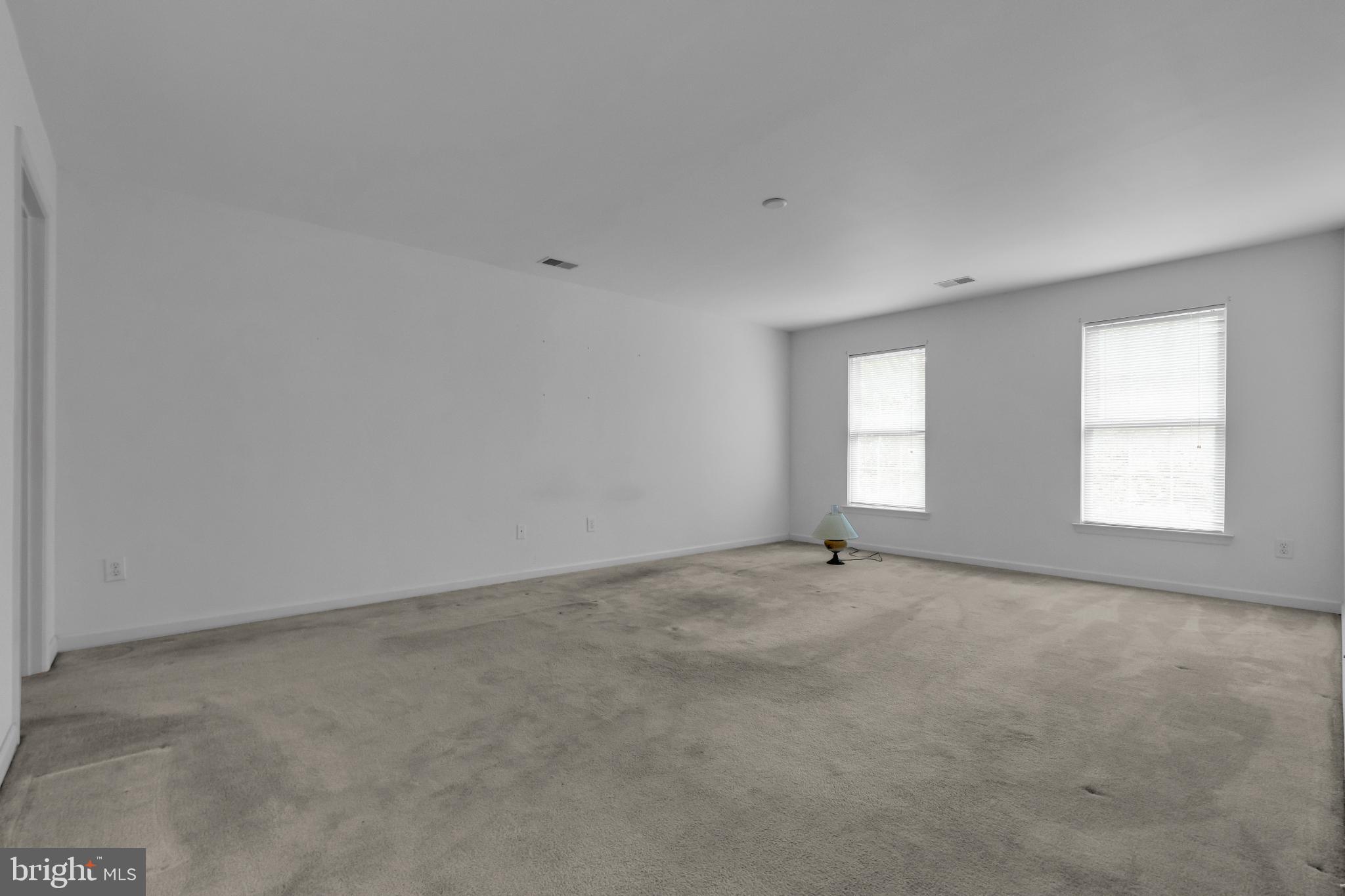 5184 Lovering Drive Doylestown, PA 18902 - Photo 22 of 51 an empty room with windows