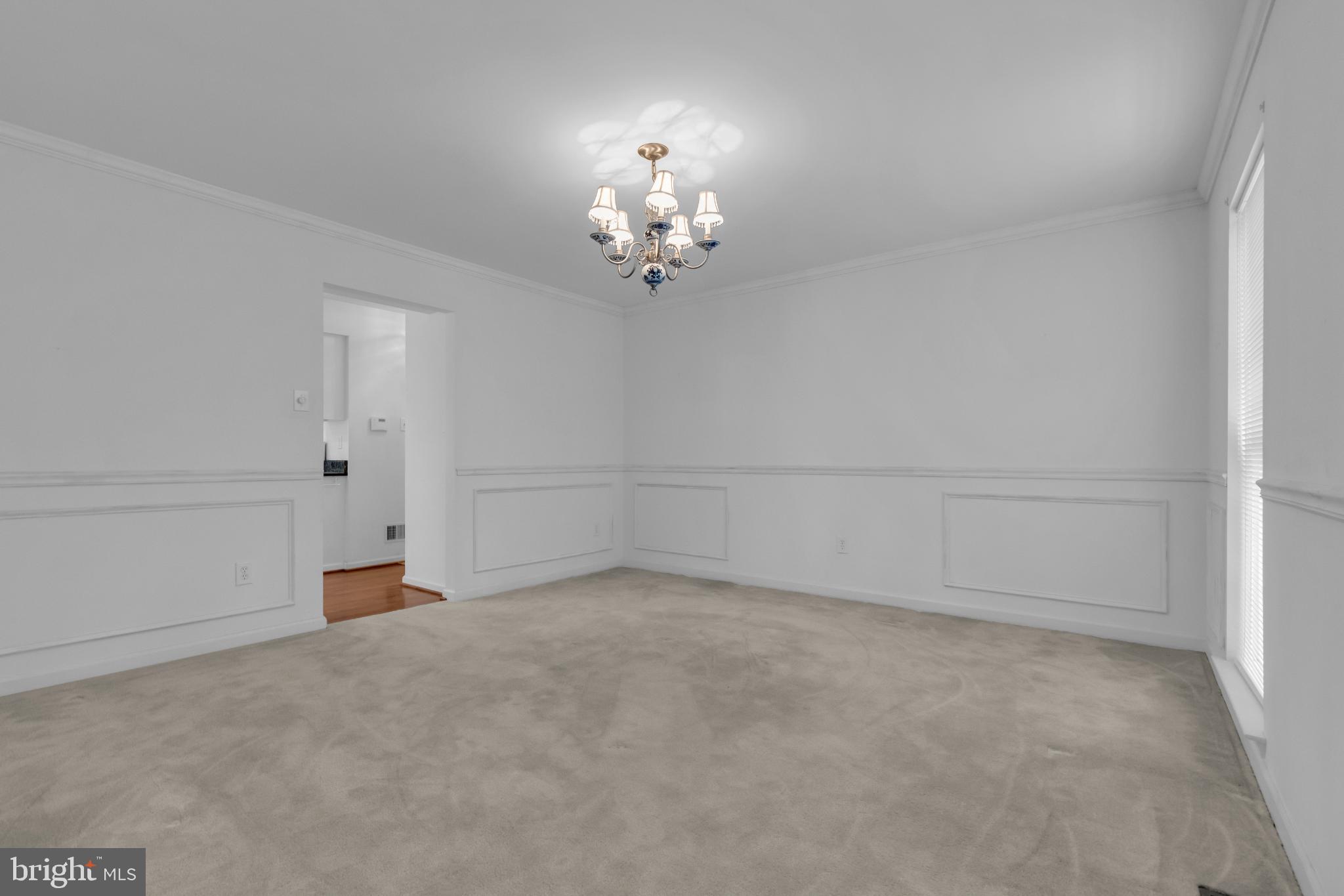 5184 Lovering Drive Doylestown, PA 18902 - Photo 4 of 51 a view of an empty room with chandelier