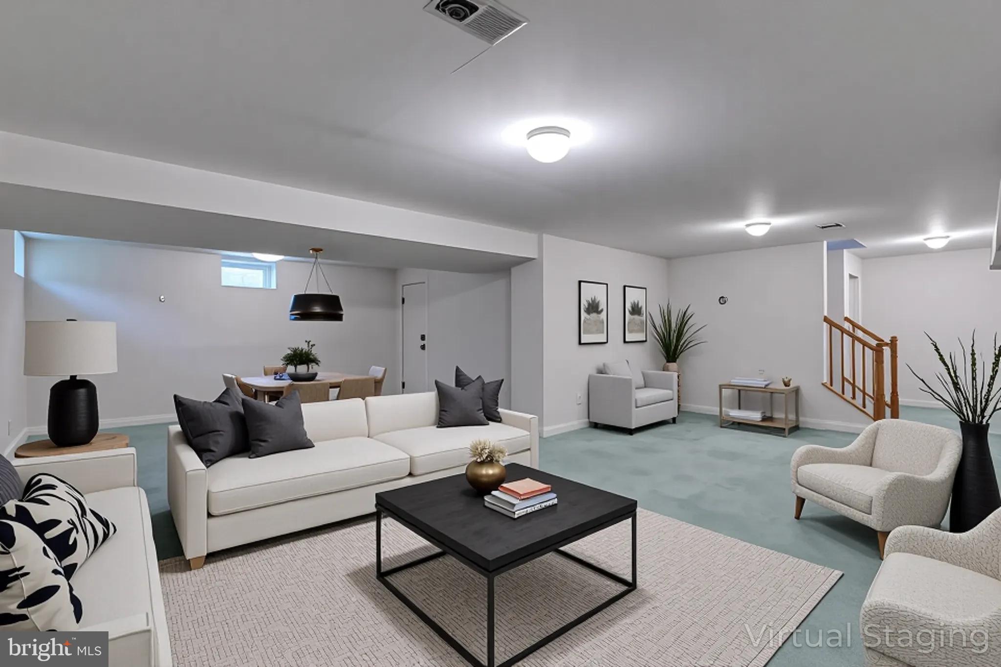5184 Lovering Drive Doylestown, PA 18902 - Photo 41 of 51 a living room with furniture and a table