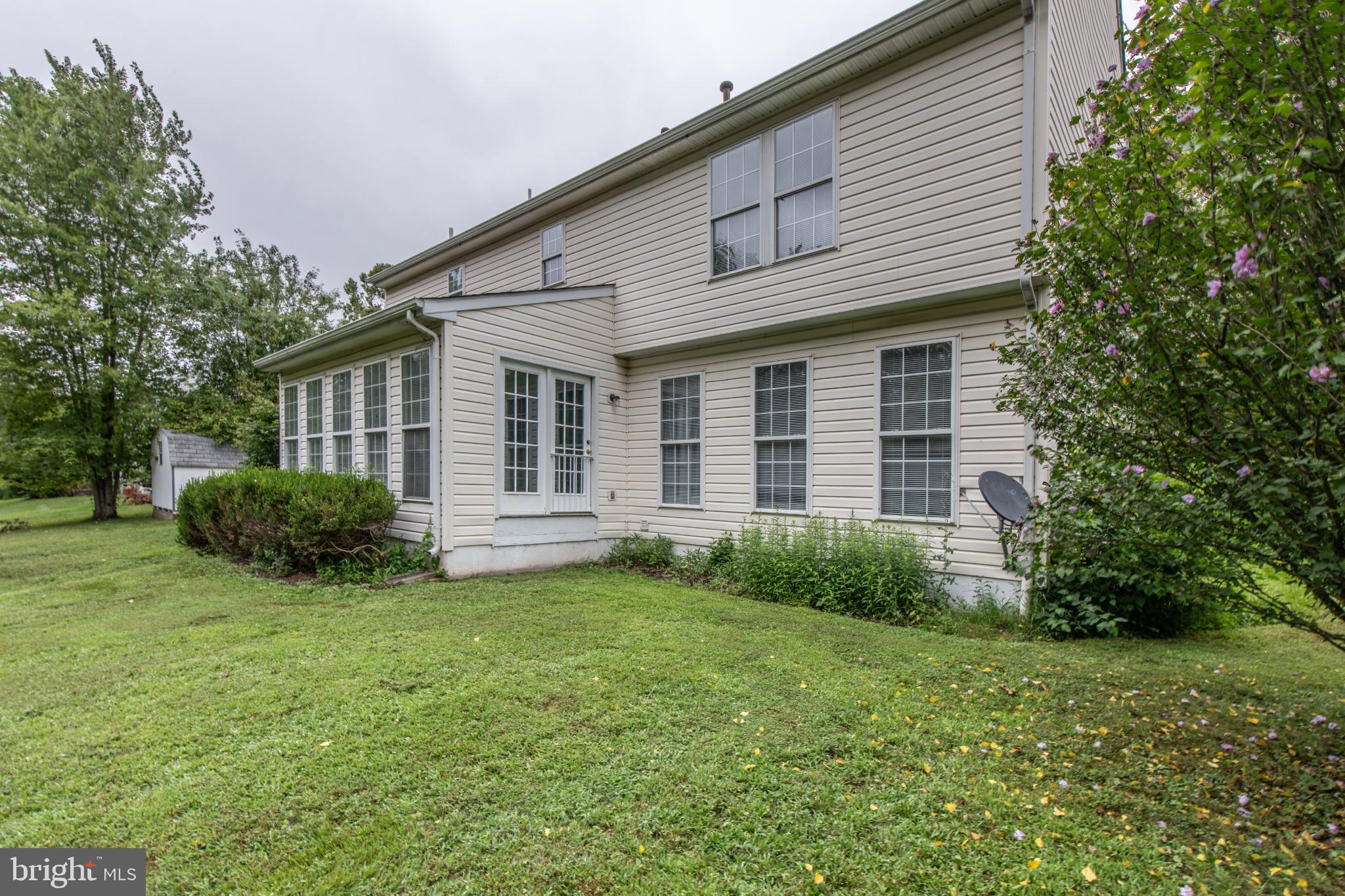 5184 Lovering Drive Doylestown, PA 18902 - Photo 45 of 51 a view of a house with a backyard