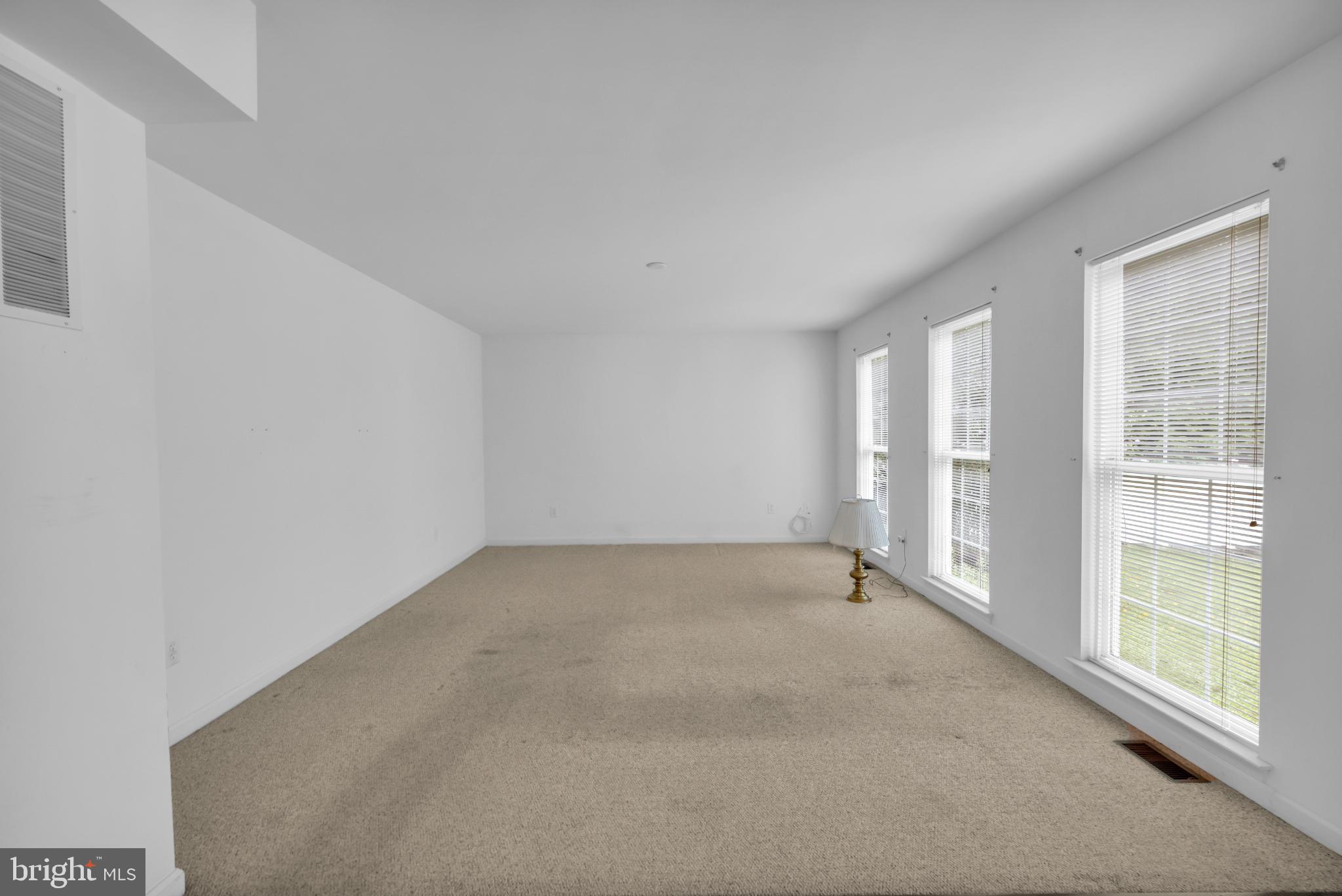 5184 Lovering Drive Doylestown, PA 18902 - Photo 10 of 51 an empty room with windows
