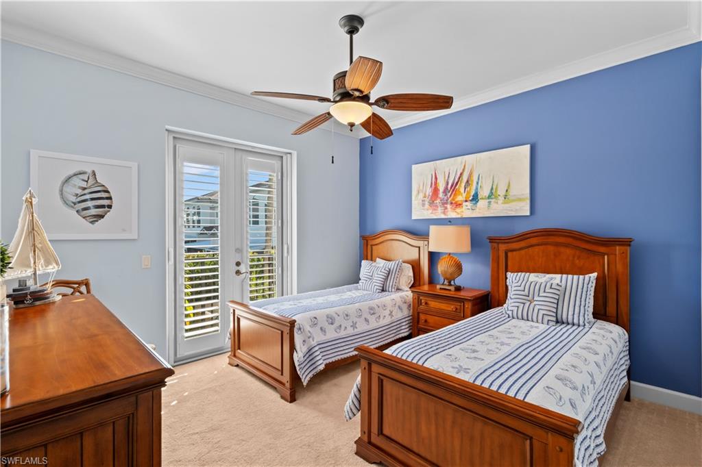 1104 6th Street South, Unit 1 Naples, FL 34102 - Photo 19 of 40 Bedroom featuring crown molding, access to outside, light colored carpet, and ceiling fan