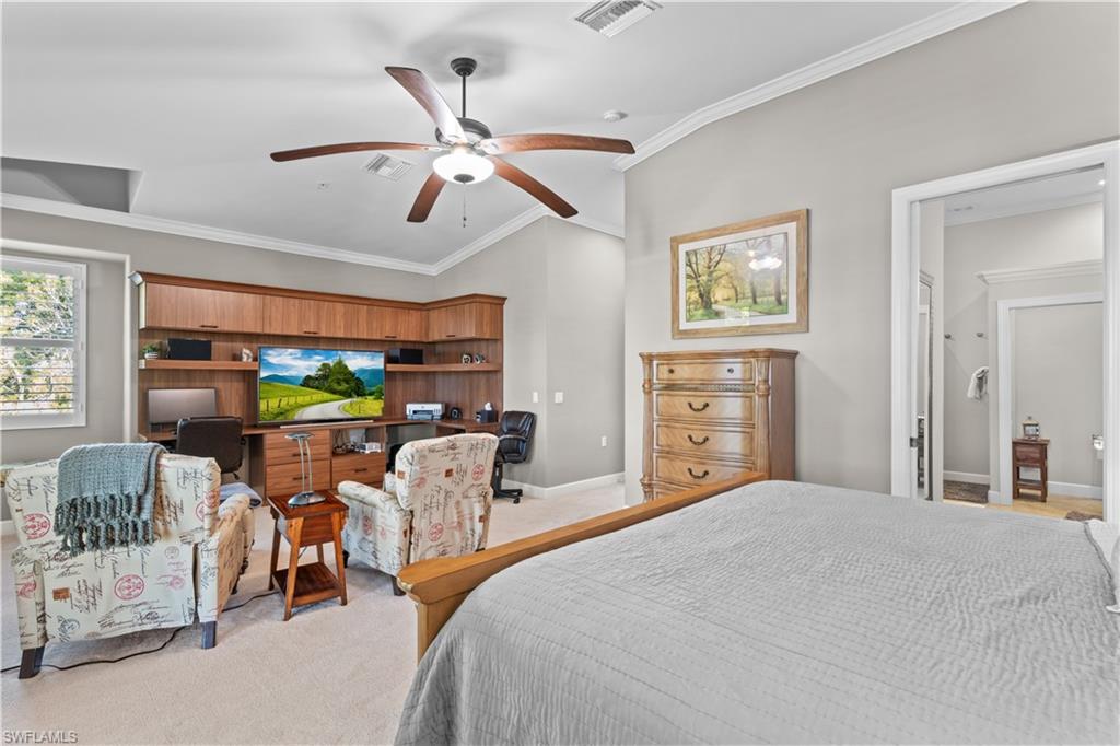 1104 6th Street South, Unit 1 Naples, FL 34102 - Photo 23 of 40 Bedroom with lofted ceiling, carpet, ornamental molding, and ceiling fan