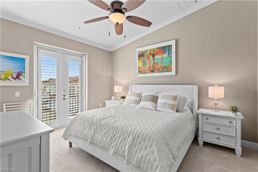 1104 6th Street South, Unit 1 Naples, FL 34102 - Photo 30 of 40 Bedroom featuring ornamental molding, light carpet, access to exterior, and ceiling fan