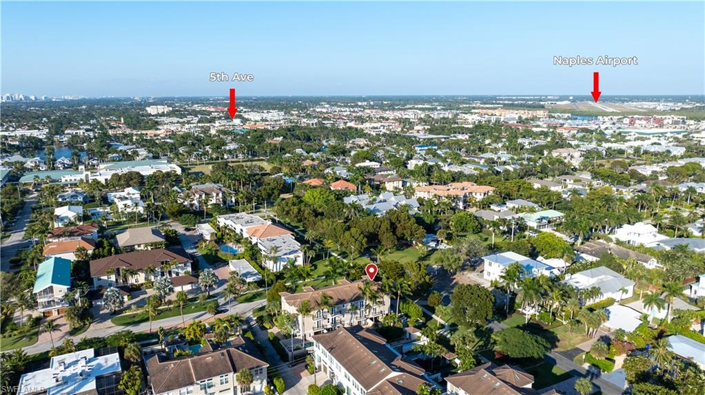 1104 6th Street South, Unit 1 Naples, FL 34102 - Photo 36 of 40 Aerial view of property and surrounding area with nearby suburban area