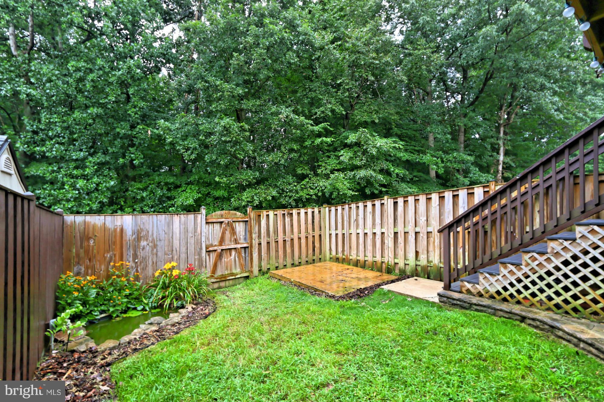6271 Rathlin Drive Springfield, VA 22152 - Photo 13 of 29 a view of a deck with a fence