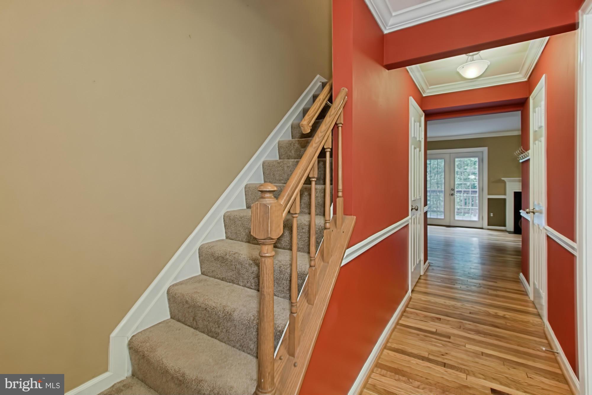 6271 Rathlin Drive Springfield, VA 22152 - Photo 15 of 29 a view of entryway and hall with wooden floor