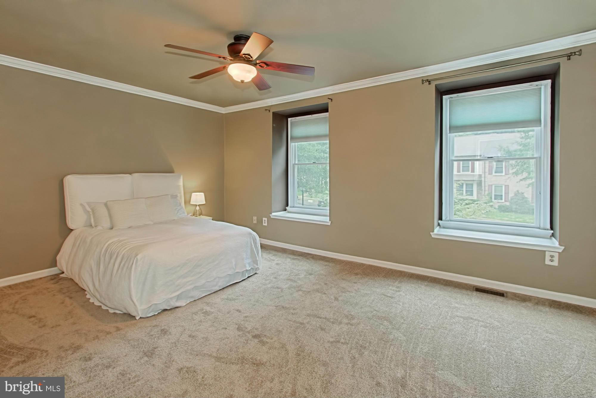 6271 Rathlin Drive Springfield, VA 22152 - Photo 16 of 29 a bedroom with a bed and window