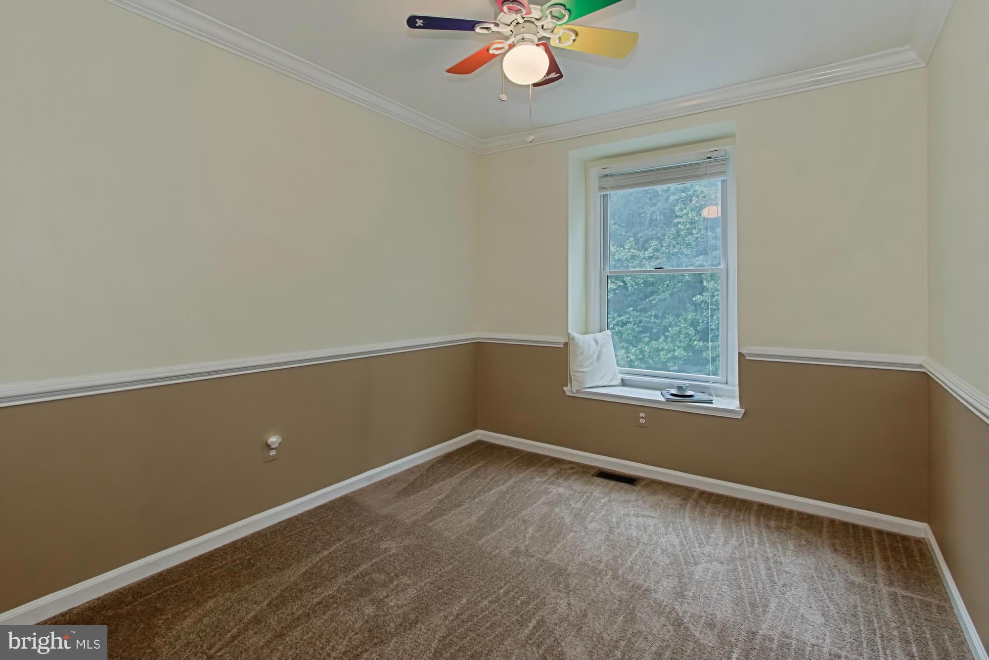 6271 Rathlin Drive Springfield, VA 22152 - Photo 19 of 29 wooden floor in an empty room with a window