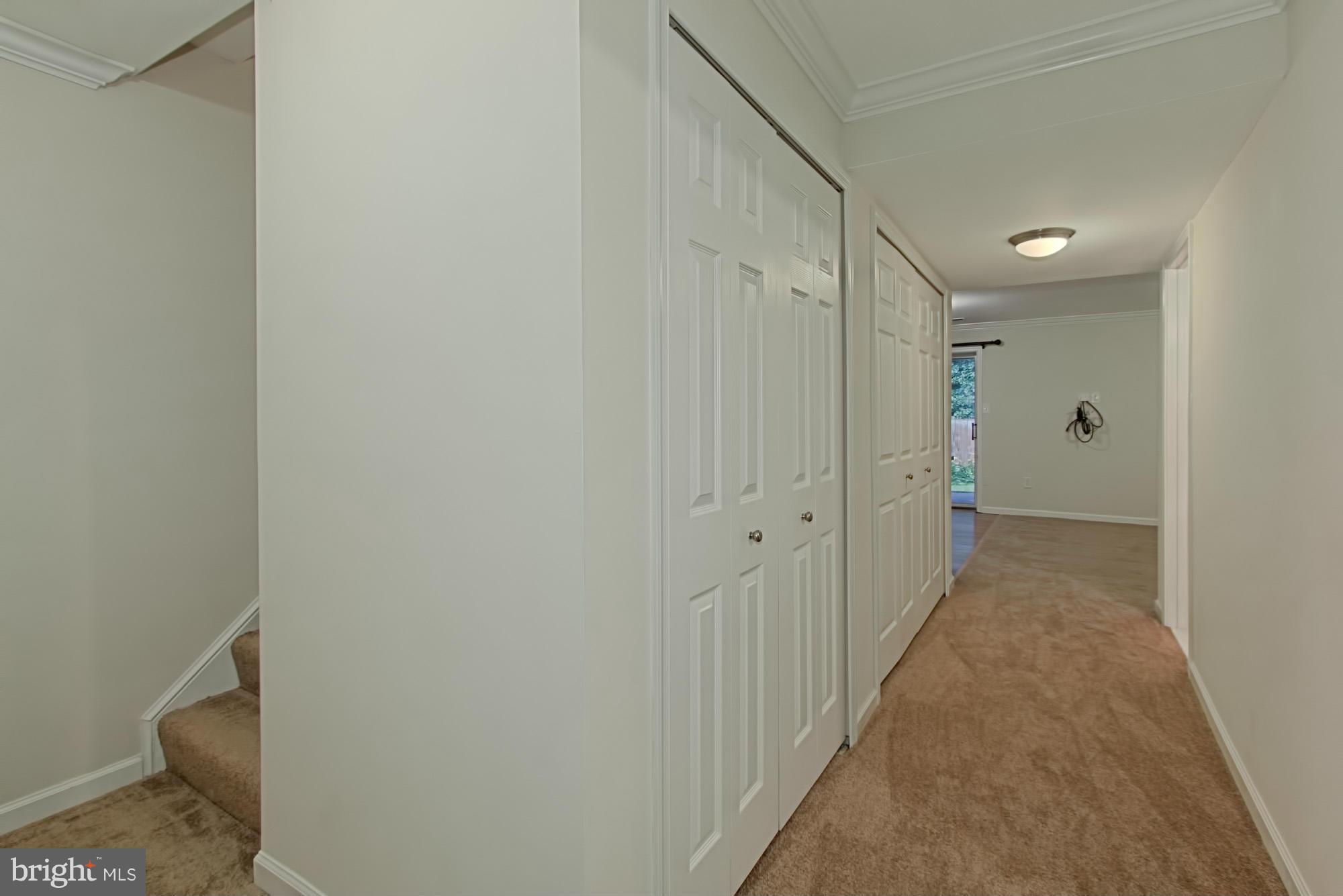 6271 Rathlin Drive Springfield, VA 22152 - Photo 22 of 29 a view of a hallway with toilet