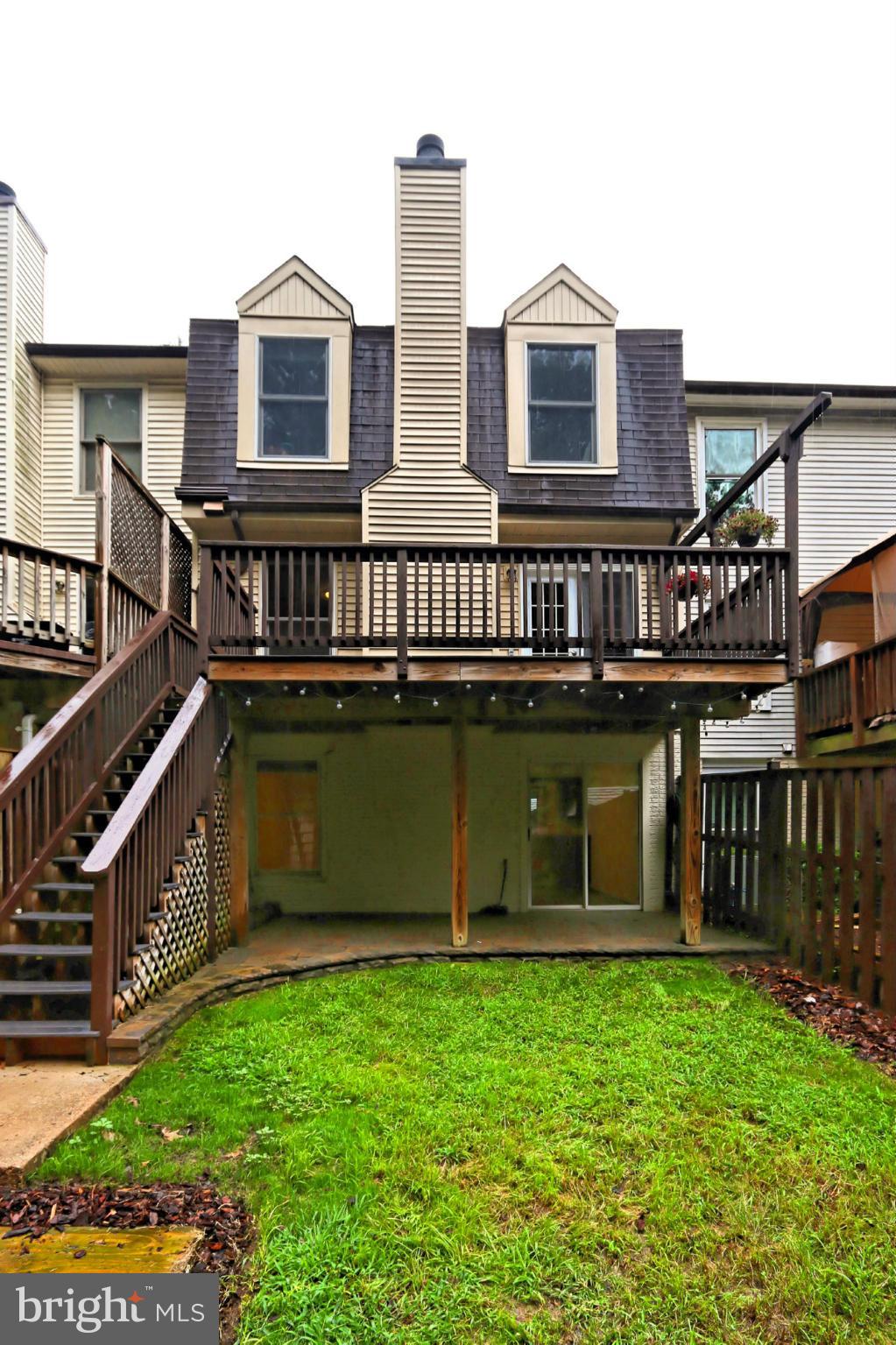 6271 Rathlin Drive Springfield, VA 22152 - Photo 28 of 29 a front view of a house with a yard