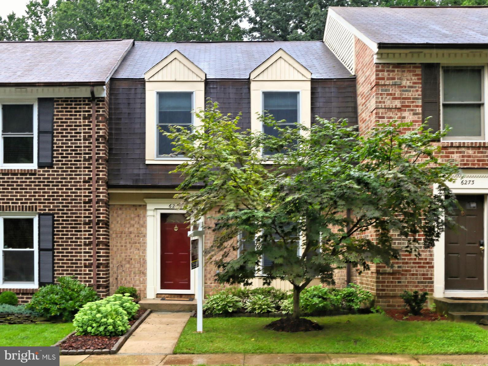 6271 Rathlin Drive Springfield, VA 22152 - Photo 29 of 29 a front view of a house with a yard and trees