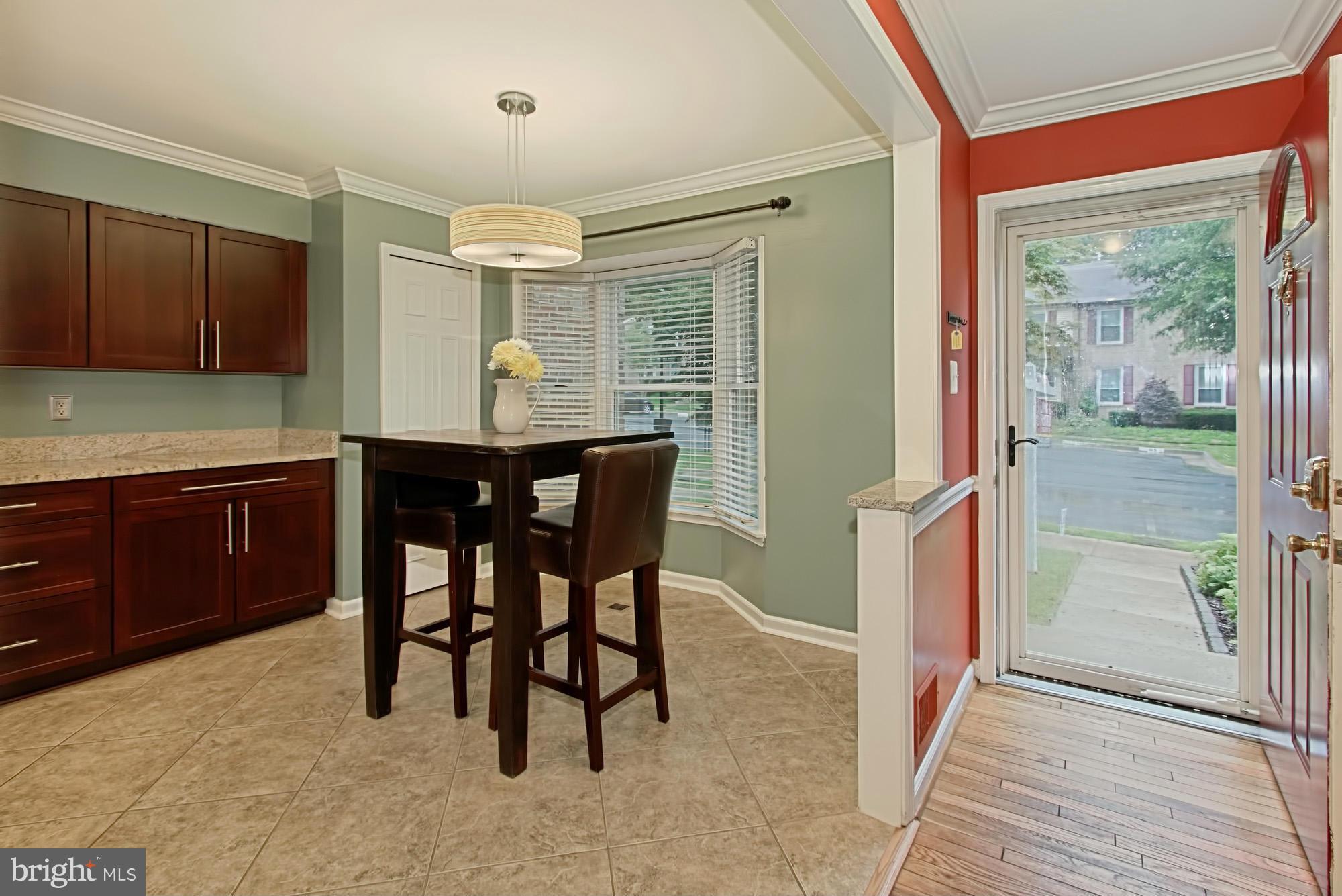 6271 Rathlin Drive Springfield, VA 22152 - Photo 4 of 29 a view of a dining room with furniture window and outside view
