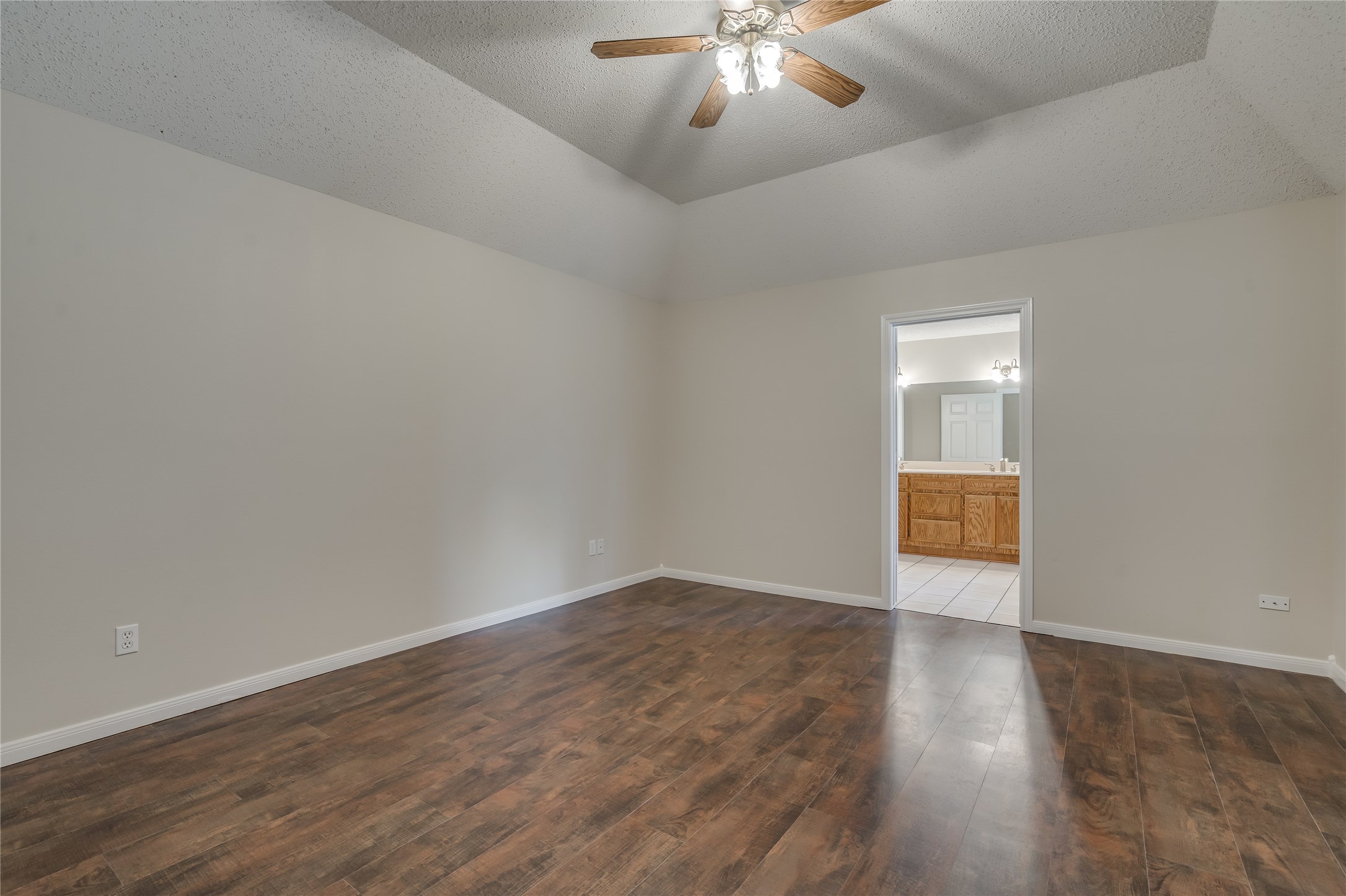 2460 Pebblebrook Circle Conroe, TX 77384 - Photo 15 of 27 Primary bedroom with ensuite bath