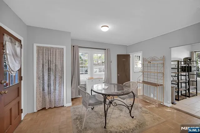 a view of a livingroom with furniture and window