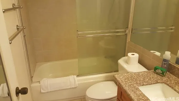 a bathroom with a sink and toilet