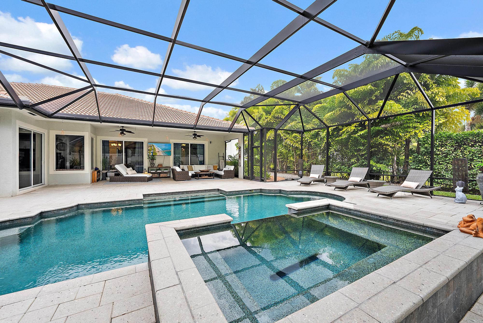 423 Rudder Cay Way Jupiter, FL 33458 - Photo 46 of 66 Covered Lanai & Screened in Pool