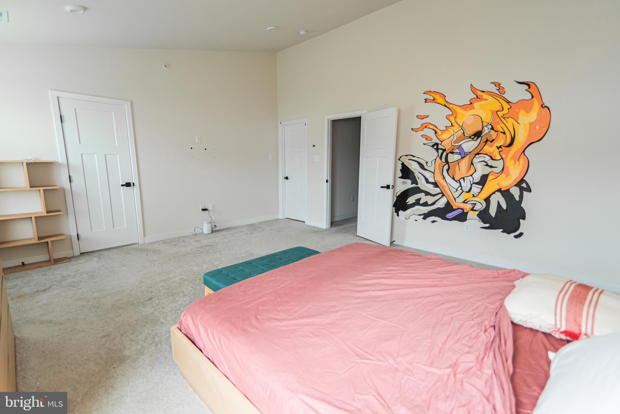 7953 Milltown Circle Cheltenham, PA 19012 - Photo 18 of 24 a bedroom with a bed and painting on the wall