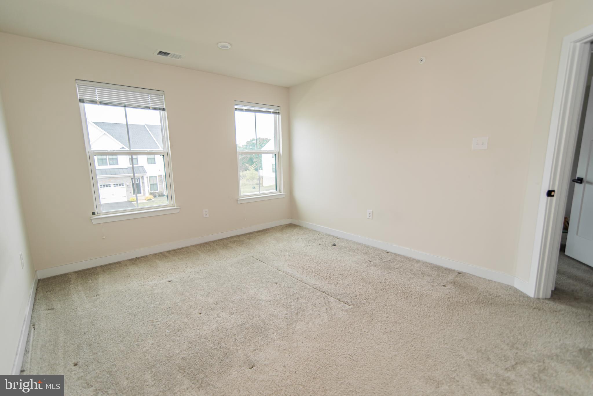 7953 Milltown Circle Cheltenham, PA 19012 - Photo 22 of 24 an empty room with windows