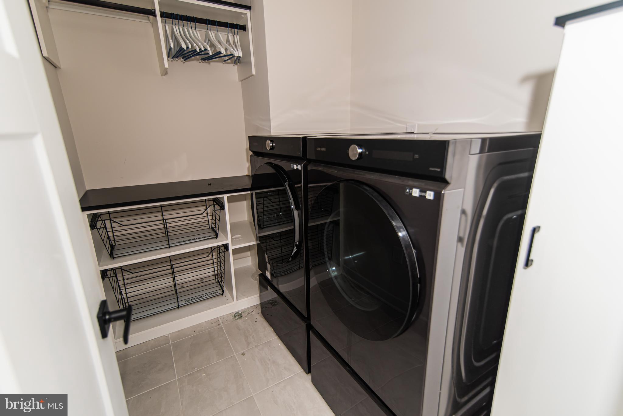 7953 Milltown Circle Cheltenham, PA 19012 - Photo 23 of 24 a view of walk in closet with clothes and shoes