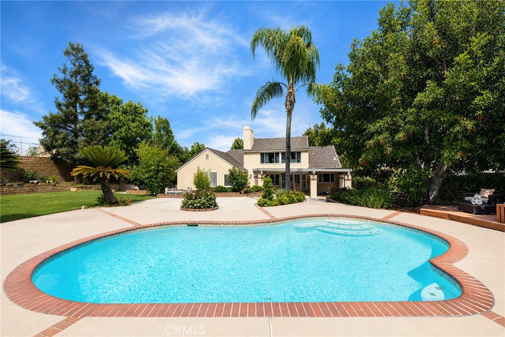 6296 Marble Avenue Rancho Cucamonga, CA 91701 - Photo 57 of 89 a view of swimming pool with a yard