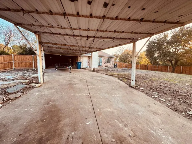 a view of a backyard of a house