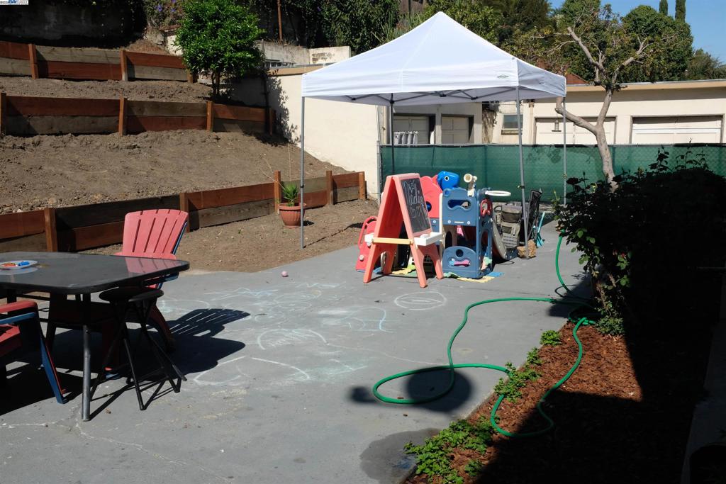 22157 Main Street Hayward, CA 94541 - Photo 4 of 10 an aerial view of a house roof deck and patio