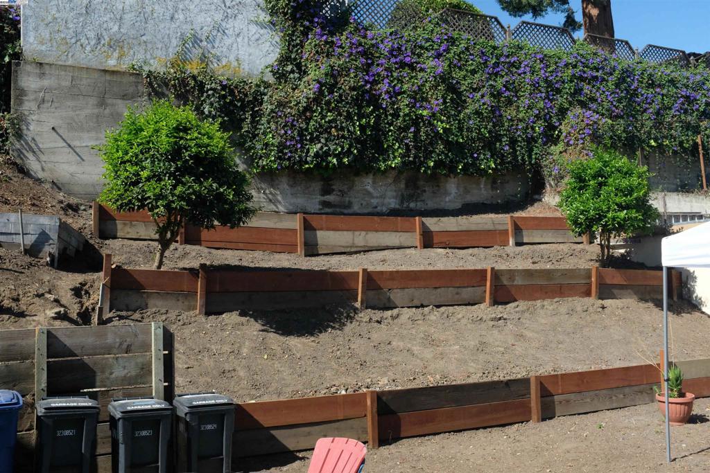 22157 Main Street Hayward, CA 94541 - Photo 5 of 10 a view of a bench in the backyard