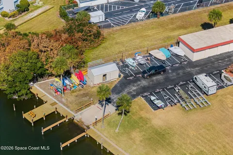 an aerial view of a house with a garden