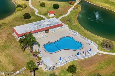 an aerial view of a swimming pool