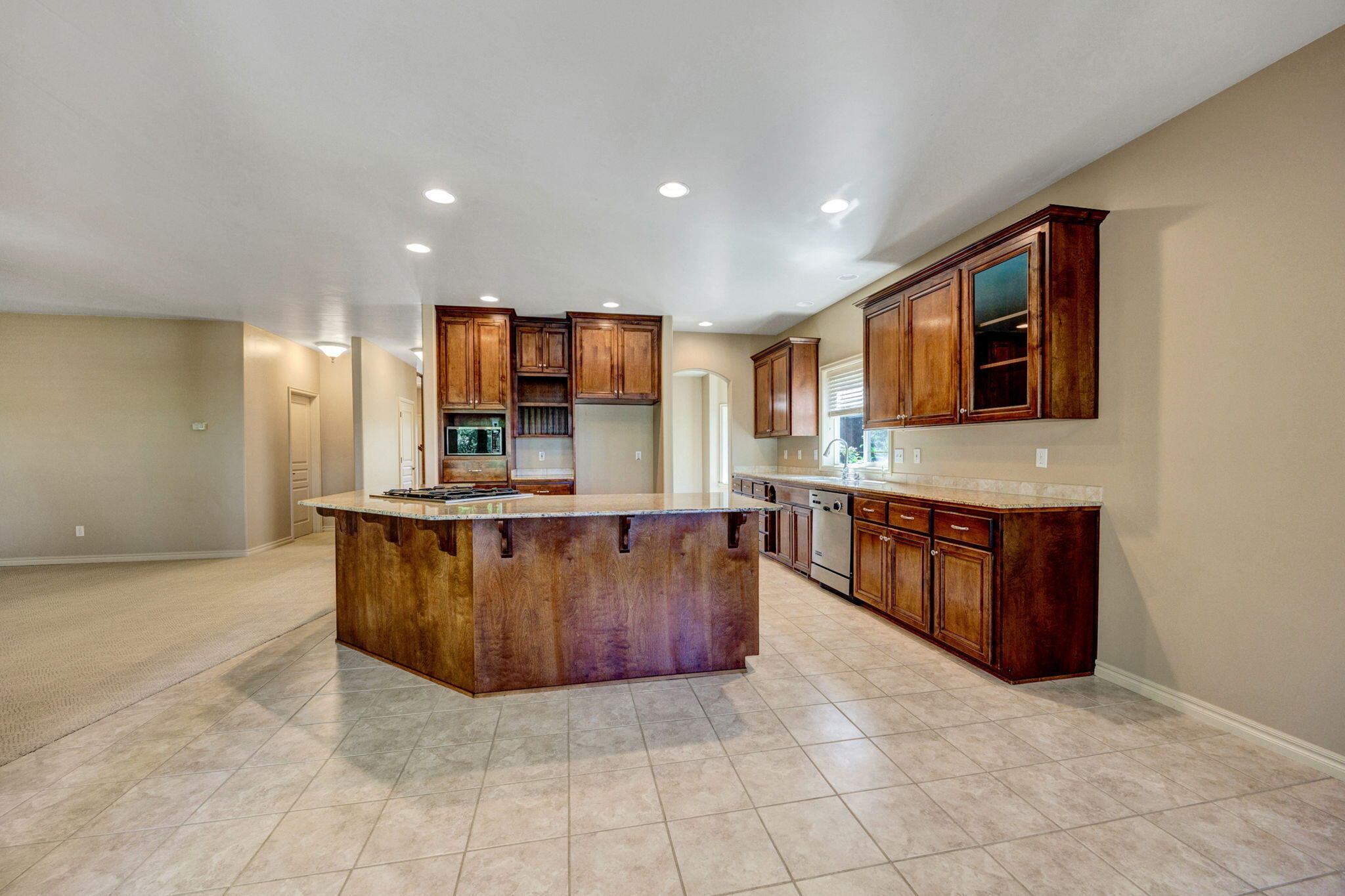 523 Ridgeway Avenue Central Point, OR 97502 - Photo 21 of 68 a large kitchen with stainless steel appliances granite countertop a large counter top and a stove
