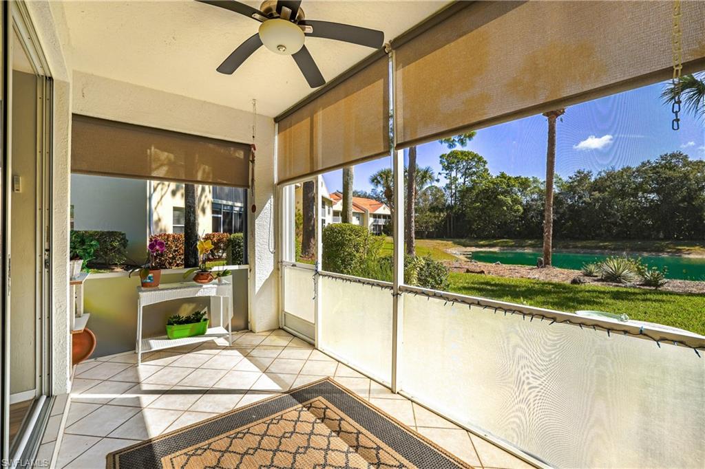 305 Robin Hood Circle, Unit 101 Naples, FL 34104 - Photo 19 of 31 a house view with a outdoor space