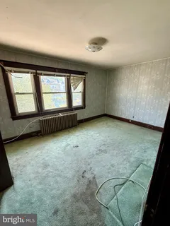 a view of a porch of a house