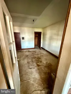 a room with furniture and window