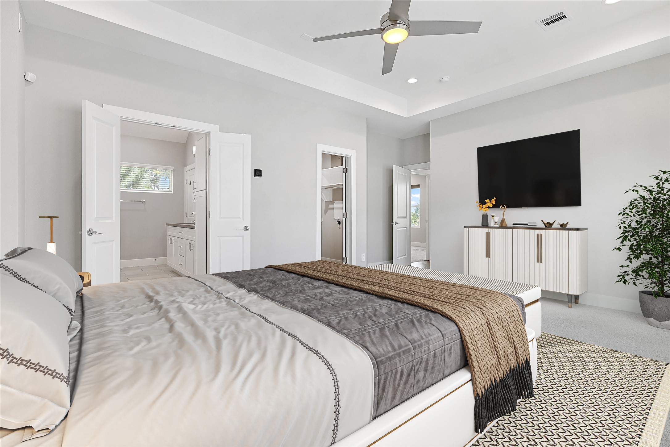 1222 Upton Street Houston, TX 77020 - Photo 20 of 41 a bedroom with a bed and a flat screen tv