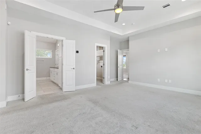 a bathroom with a granite countertop sink mirror and double