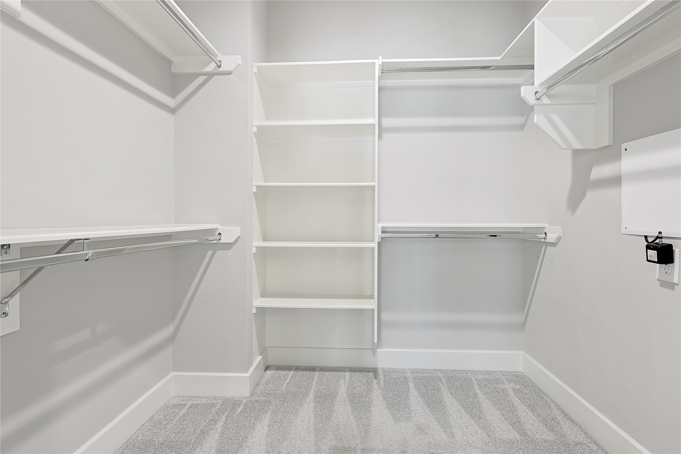 1222 Upton Street Houston, TX 77020 - Photo 26 of 41 a view of walk in closet with empty racks