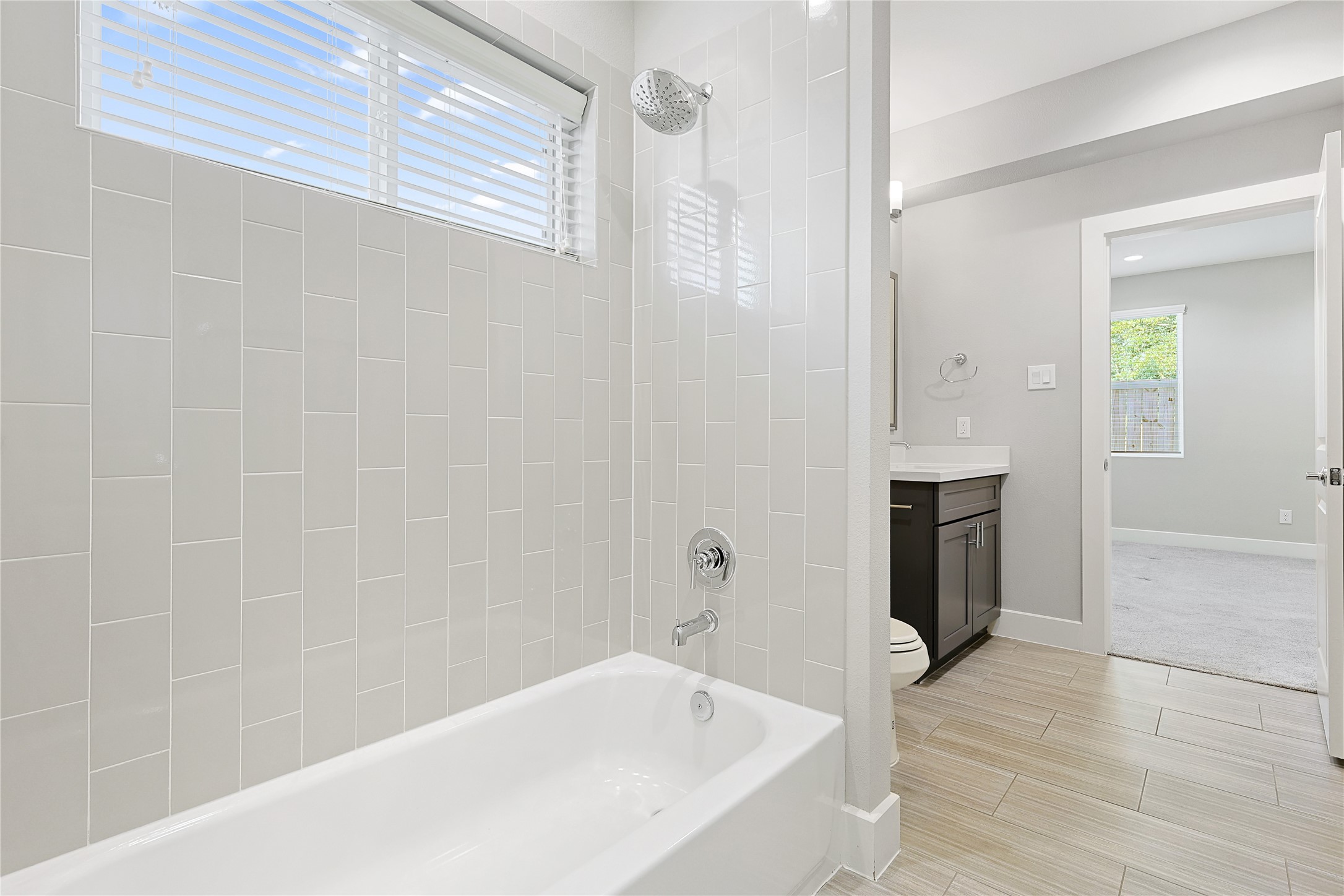 1222 Upton Street Houston, TX 77020 - Photo 8 of 41 a bathroom with a bathtub and a shower