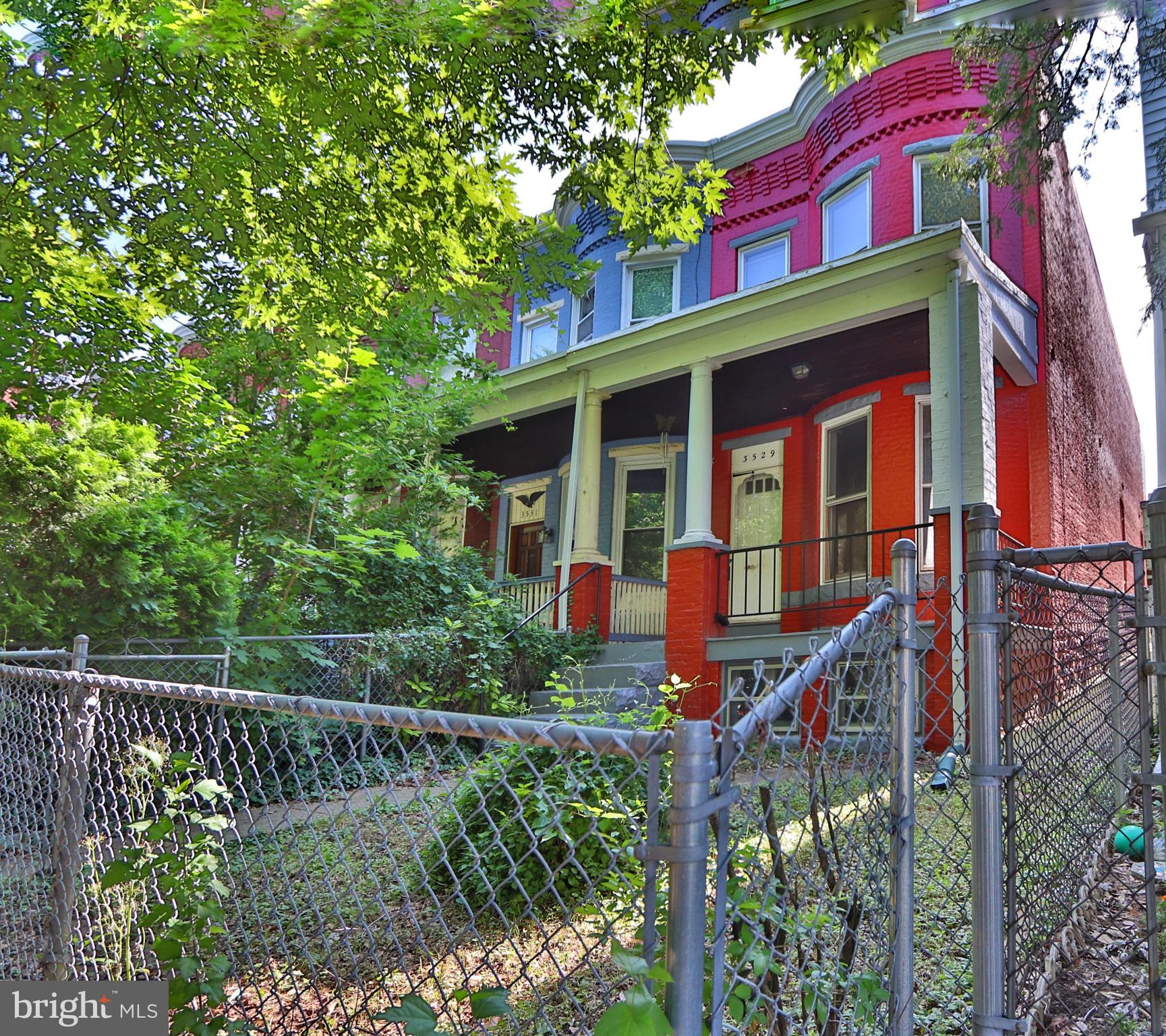 3529 Roland Avenue Baltimore, MD 21211 - Photo 1 of 16 Front of home with fenced-in front yard