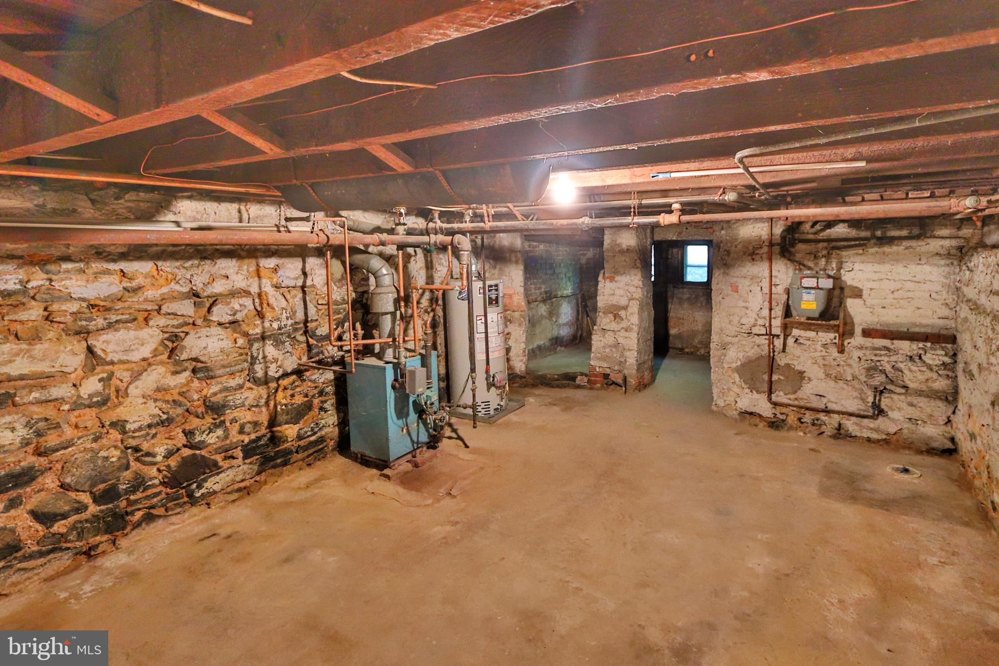 3529 Roland Avenue Baltimore, MD 21211 - Photo 14 of 16 Unfinished basement with utilities