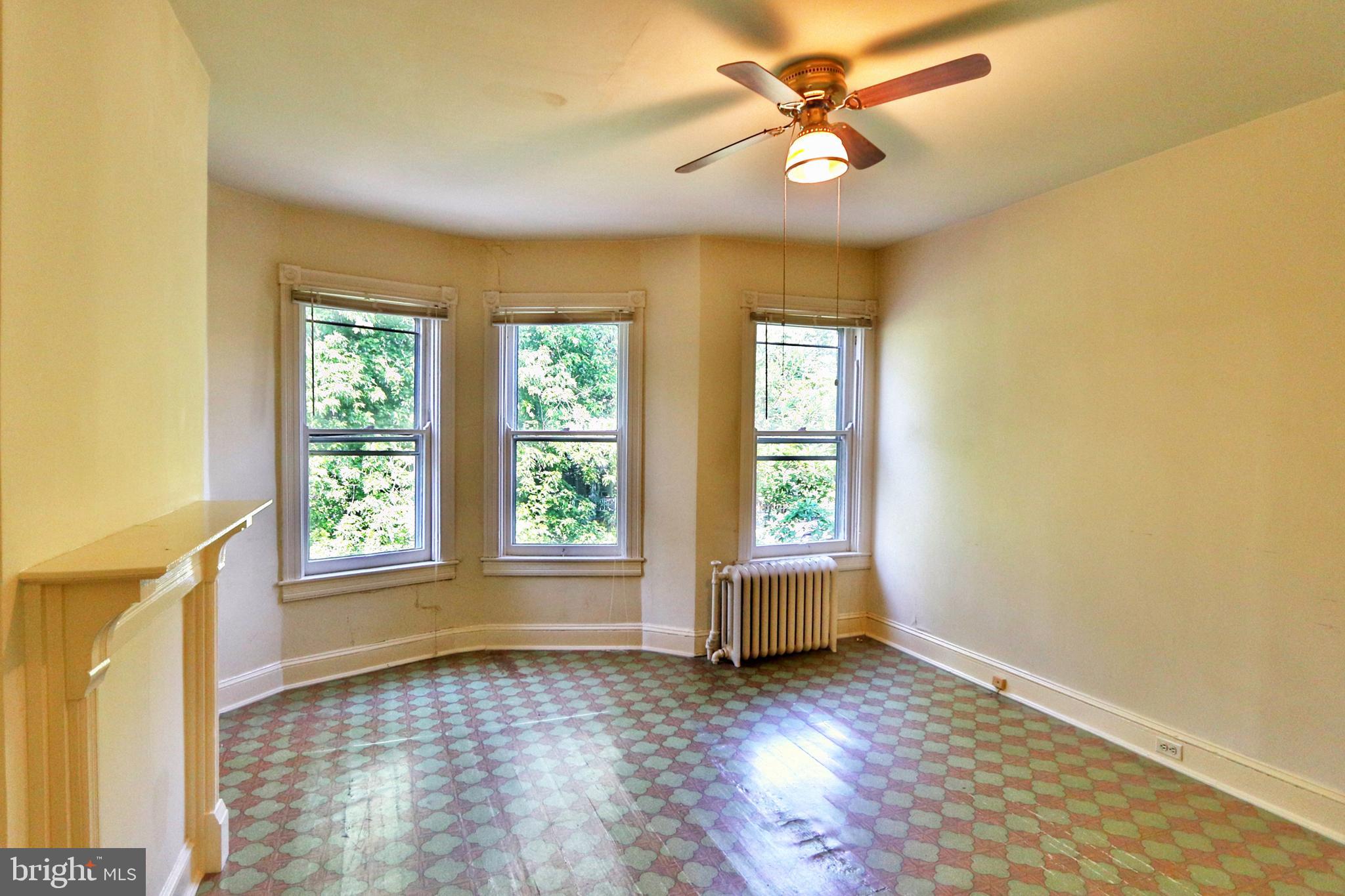 3529 Roland Avenue Baltimore, MD 21211 - Photo 8 of 16 Front bedroom with nice large windows