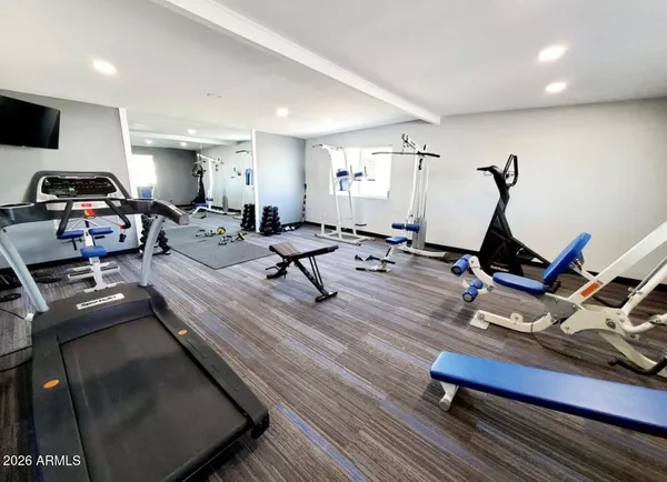 a view of a kitchen area with furniture and windows