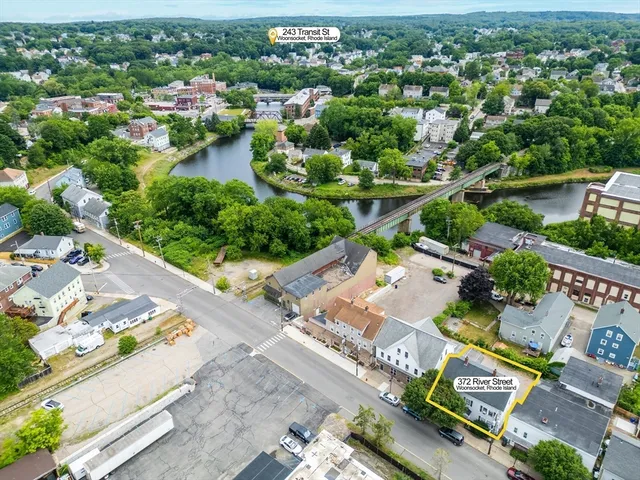 an aerial view of a city with lots of residential buildings