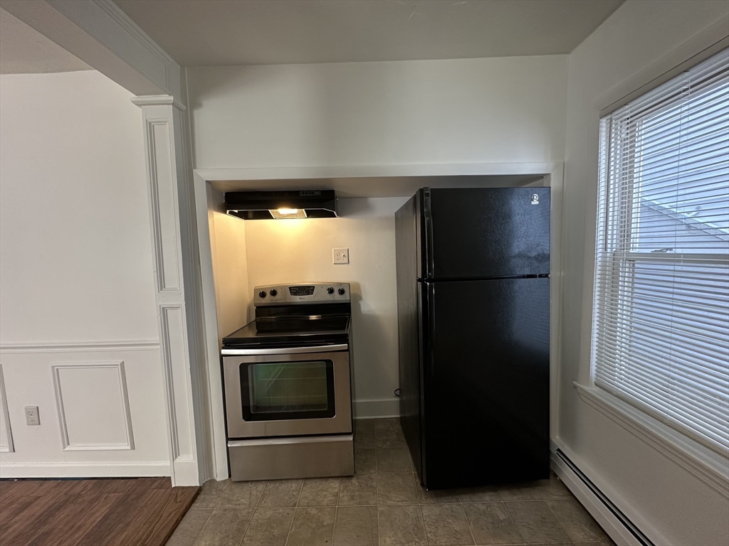 0 River & Transit Street Woonsocket, RI 02895 - Photo 20 of 33 a refrigerator freezer sitting inside of a kitchen