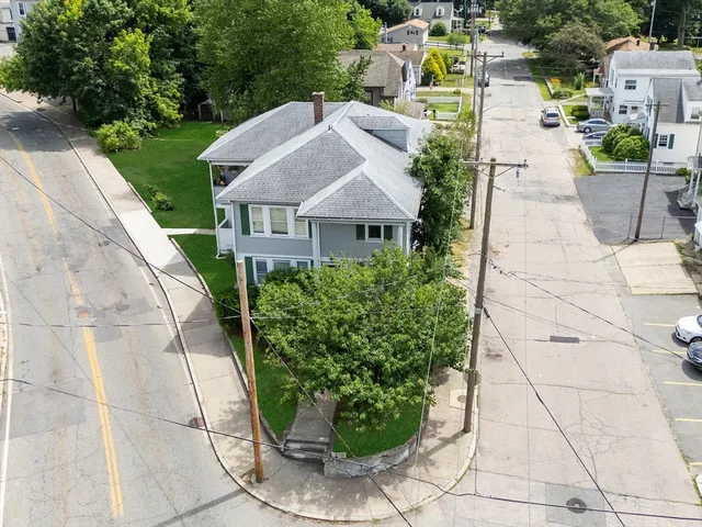 a aerial view of a house with garden