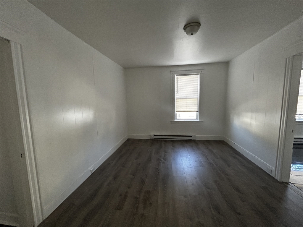 0 River & Transit Street Woonsocket, RI 02895 - Photo 25 of 33 an empty room with wooden floor and windows