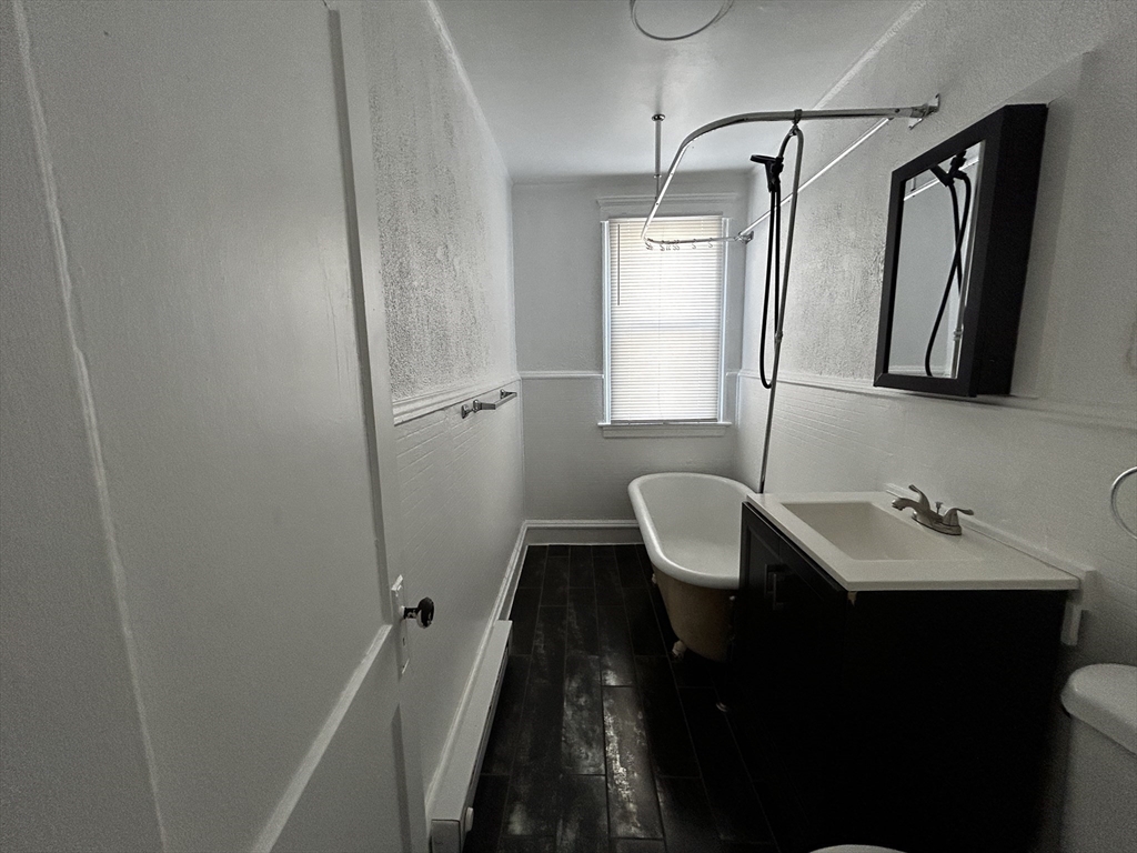 0 River & Transit Street Woonsocket, RI 02895 - Photo 26 of 33 a bathroom with a sink toilet and tub