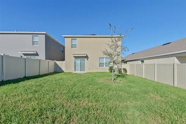a house with garden in front of it